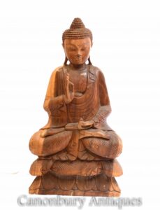 Estátua de Buda tibetano esculpida - arte em pose de lótus do budismo